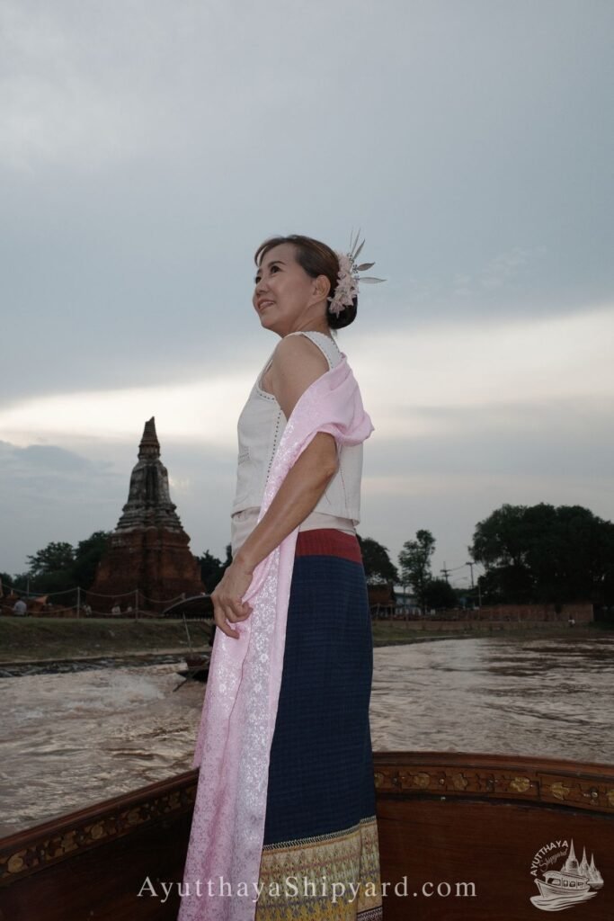 Discover Ayutthaya by River: A Cultural Cruise Experience Ayutthaya boat tour, Thai traditional dress, Chao Phraya River, temple view, Ayutthaya photography