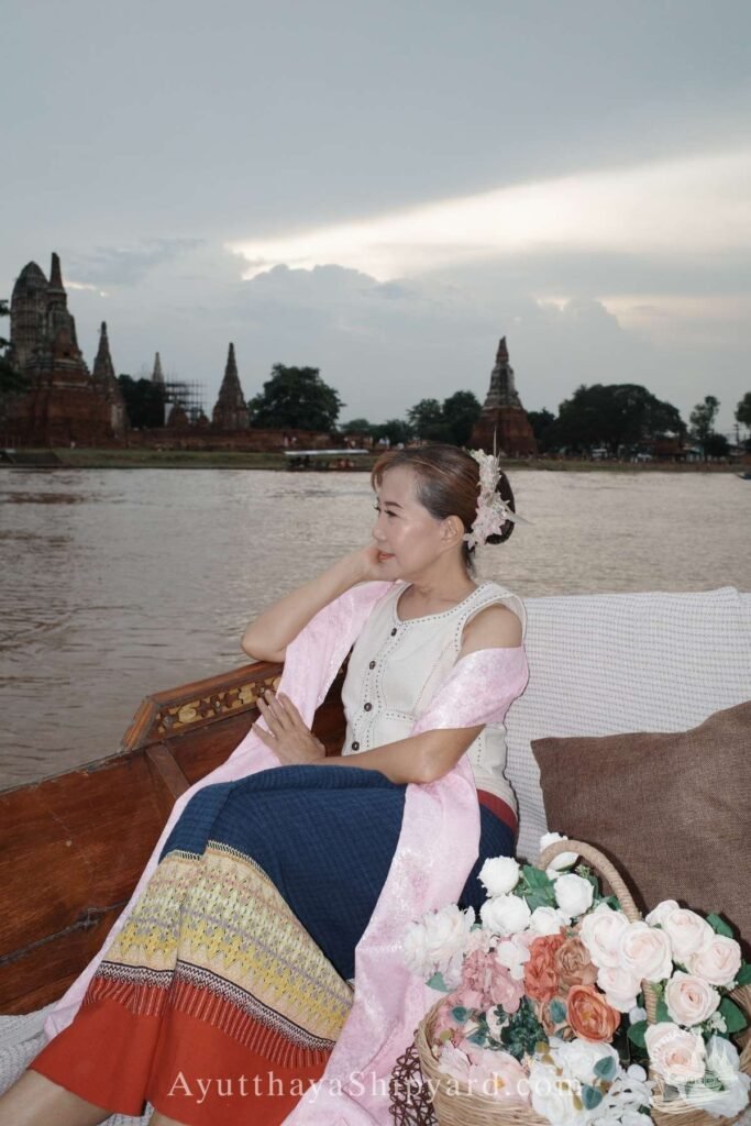 Discover Ayutthaya by River: A Cultural Cruise Experience Ayutthaya boat tour, Thai traditional dress, Chao Phraya River, temple view, Ayutthaya photography