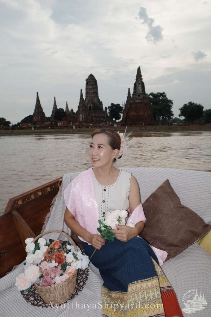Discover Ayutthaya by River: A Cultural Cruise Experience Ayutthaya boat tour, Thai traditional dress, Chao Phraya River, temple view, Ayutthaya photography