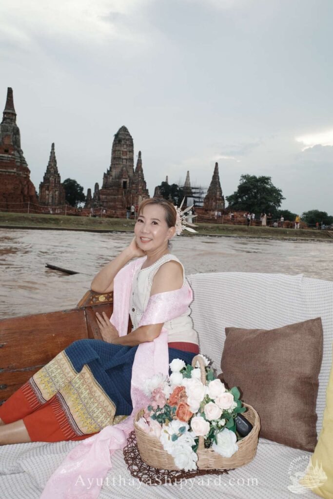 Discover Ayutthaya by River: A Cultural Cruise Experience Ayutthaya boat tour, Thai traditional dress, Chao Phraya River, temple view, Ayutthaya photography