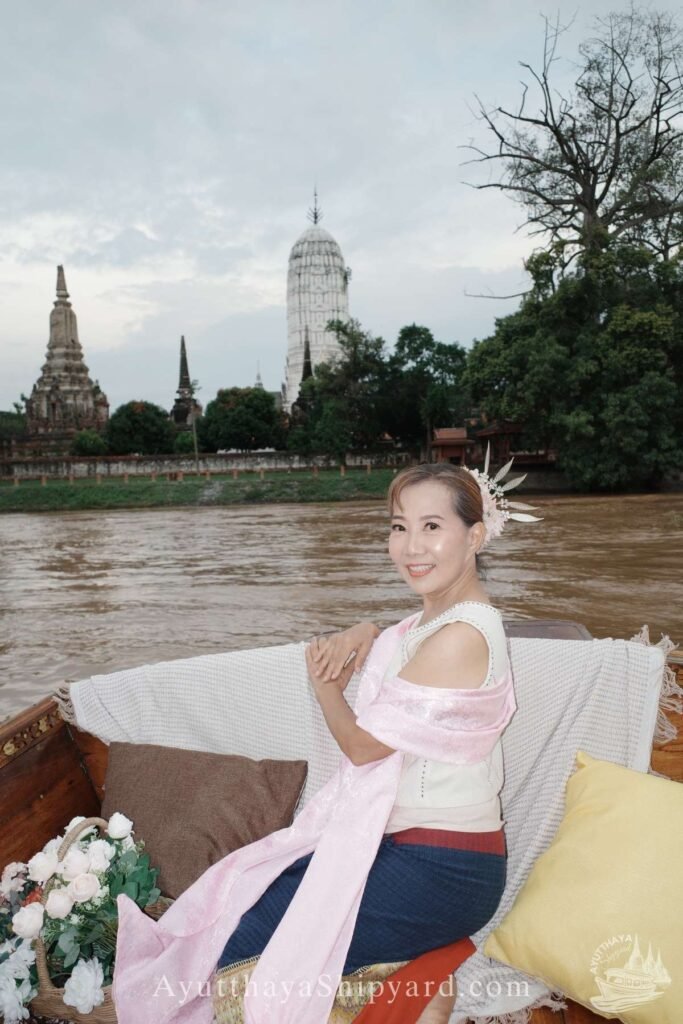 Discover Ayutthaya by River: A Cultural Cruise Experience Ayutthaya boat tour, Thai traditional dress, Chao Phraya River, temple view, Ayutthaya photography