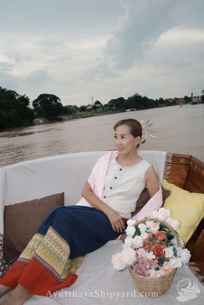 Discover Ayutthaya by River: A Cultural Cruise Experience Ayutthaya boat tour, Thai traditional dress, Chao Phraya River, temple view, Ayutthaya photography